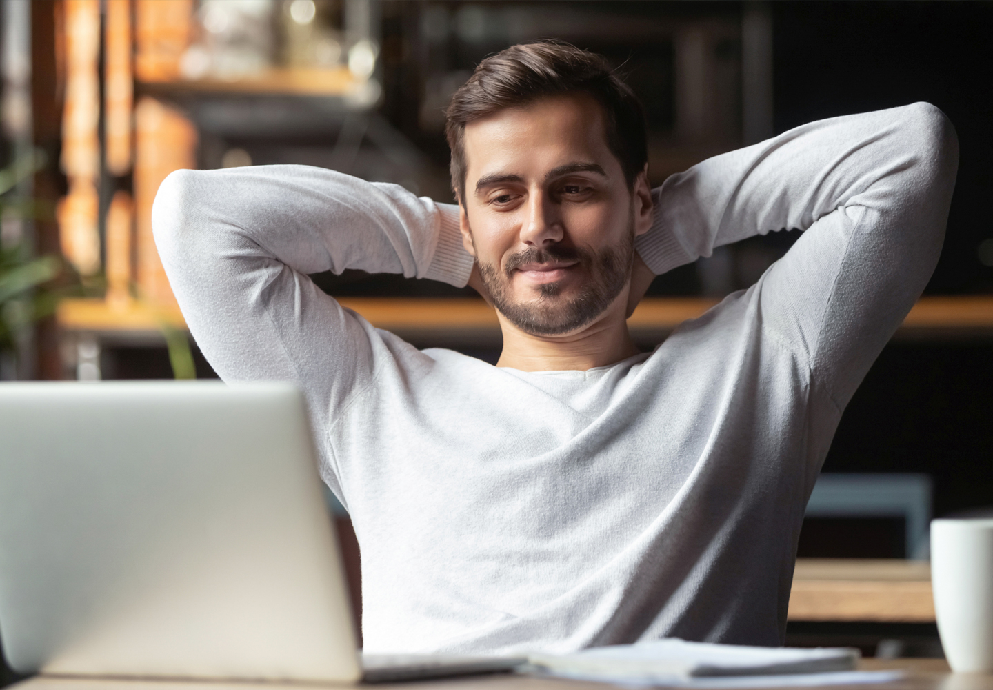 Man looking at laptop screen